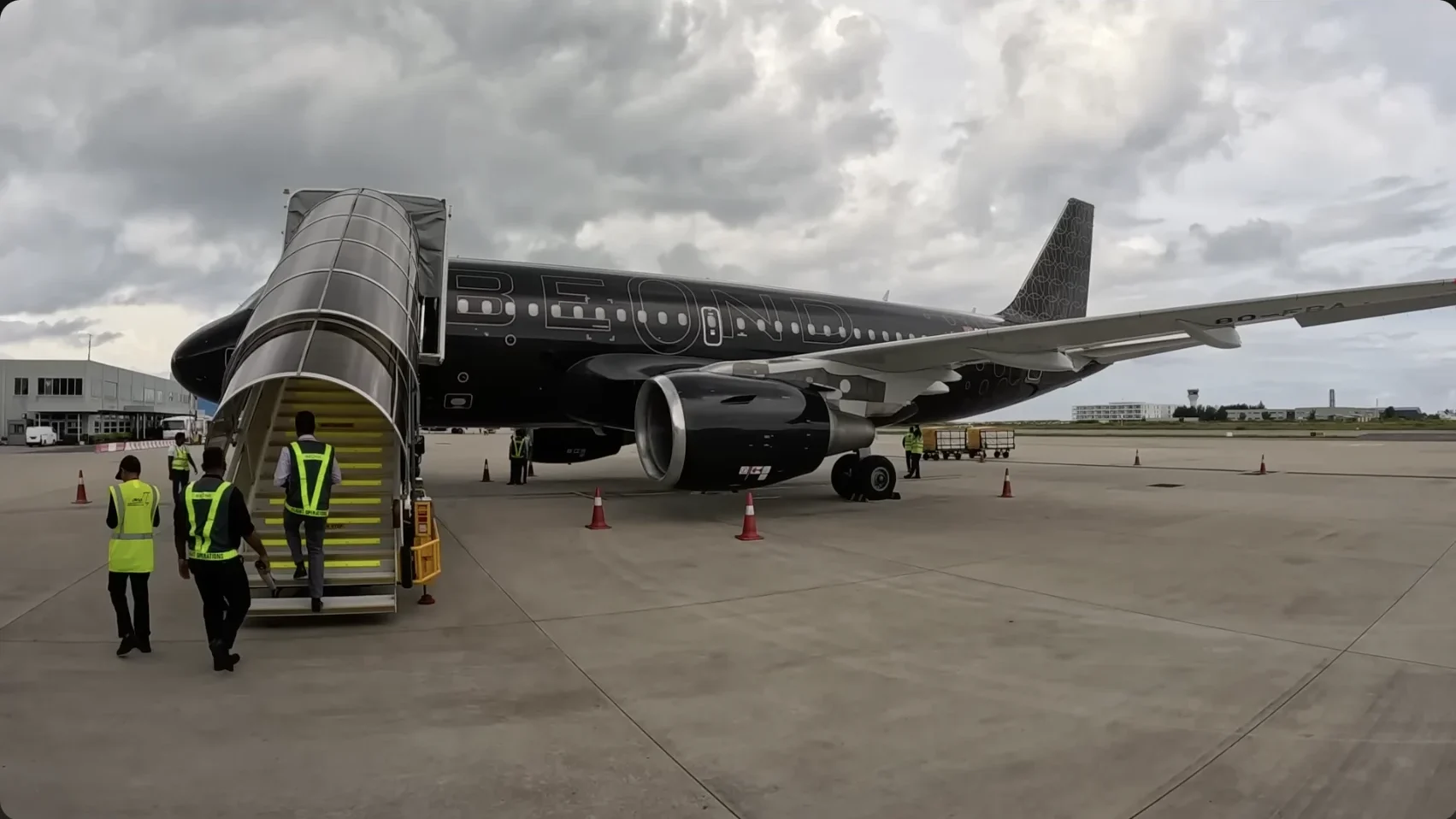 Beond Airline Black Airbus A319 exterior view front left